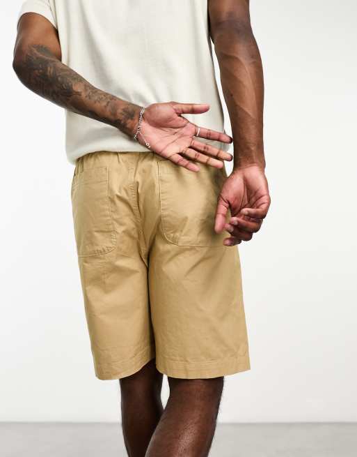 Selected Homme loose fit short with elasticized waist in beige ASOS