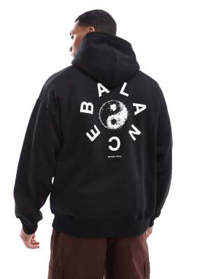 oversized hoodie in black with Balance circle back print