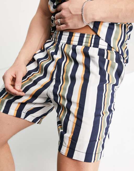 Pantaloncini adidas righe hot sale verticali