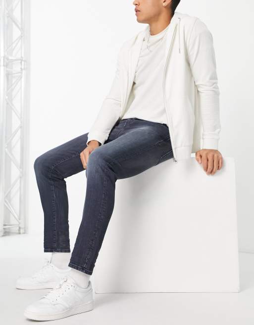 Selected Homme – Schmal zulaufende Stretch-Jeans aus Baumwolle mit schmalem Schnitt in blaugrauer Waschung - MBLUE