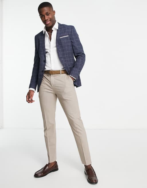 Blue jacket shop with beige pants