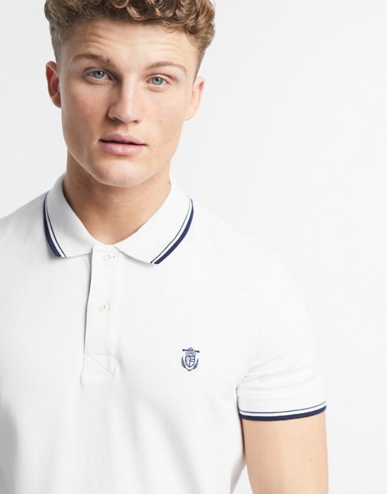 https://images.asos-media.com/products/selected-homme-tipped-polo-with-shield-logo-in-white/23380289-3?$n_550w$&wid=550&fit=constrain