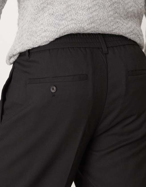 Selected – Locker geschnittene, schmal zulaufende Hose in Schwarz mit Kordelzug am Bund , 5 von 5