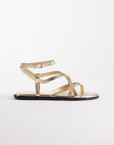 SEQWL – Flache Riemchensandalen in Gold mit Schnalle - view 1