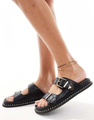 SEQWL - Flache Sandalen in Schwarz mit Kontrast-Details an der Sohle