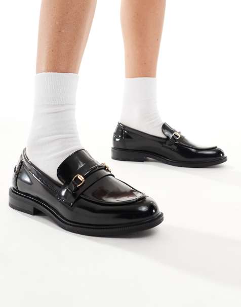 SEQWL Flat heel loafers with metal buckle in black - view 1