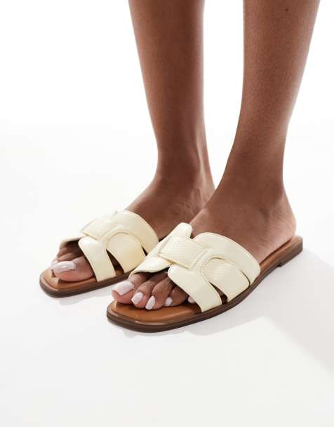 SEQWL flat sandals in pastel yellow faux leather - view 1