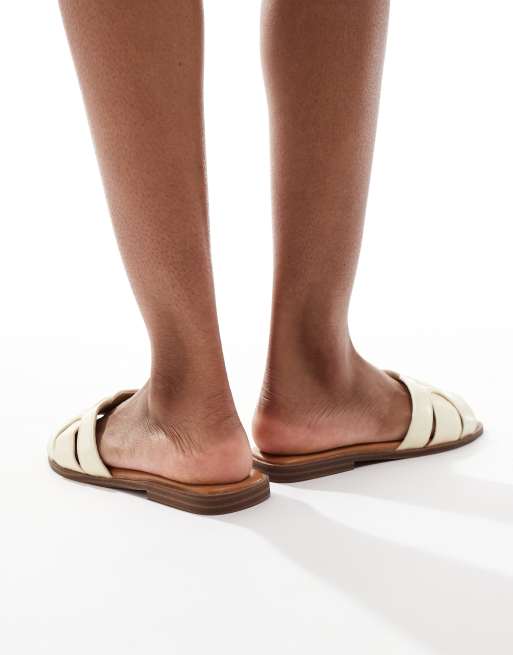 SEQWL flat sandals in pastel yellow faux leather