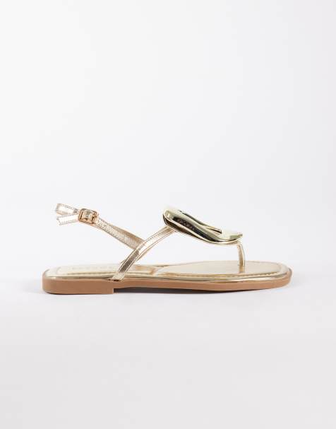 SEQWL flat sandals with gold embellishment in gold - view 1