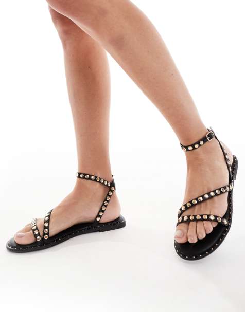 SEQWL flat sandals with studded staps in black - view 1