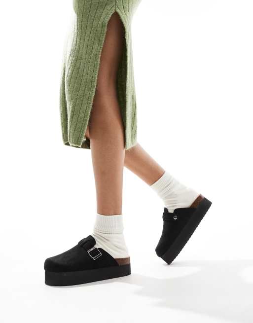 SEQWL flatform clogs in black ASOS