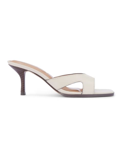 SEQWL Heeled mule slip on sandals with stitch trim details in cream - view 1