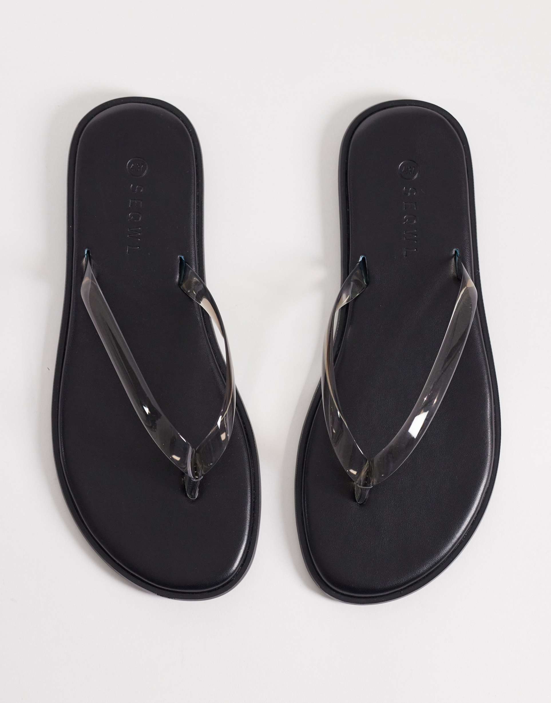 seqwl jelly flip flops in black