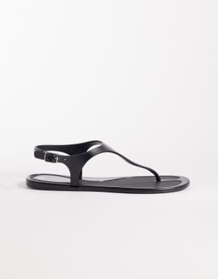 Seqwl Jelly Thong Sandals With Buckle Detail In Black