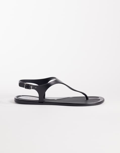 SEQWL – Jelly-Zehenstegsandalen in Schwarz mit Schnallendetail - view 1