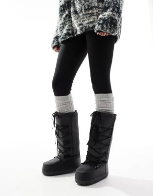 knee high snow boots in black