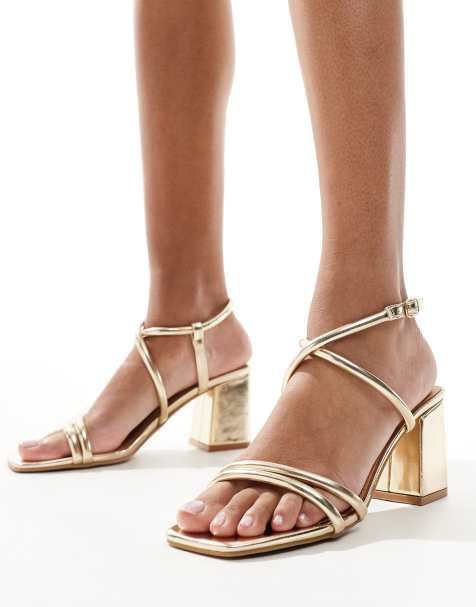 SEQWL mid block heel sandals in gold - view 1