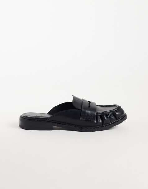SEQWL - Mules tipo penny loafer en negro de piel sintética - view 1