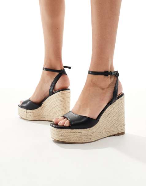 SEQWL Open toe wedge sandals with buckle strap in black - view 1