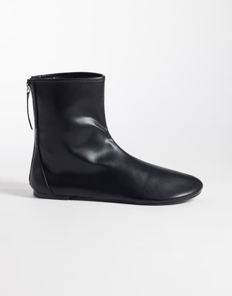 SEQWL refined ankle boots in black - view 1