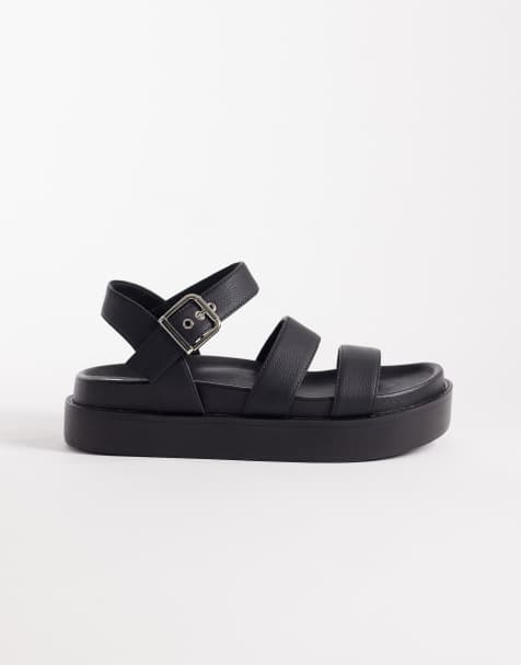 SEQWL – Riemchensandalen in Schwarz mit flacher Plateausohle - view 1