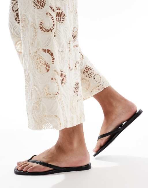 SEQWL Rooney Wide Fit thong sandals in black | ASOS