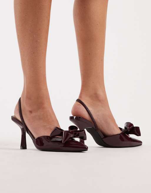 SEQWL - Salado - Scarpe con tacco largo e cinturino posteriore in vernice color mora con fiocco