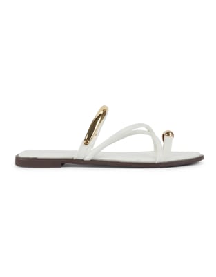  Slip on flat sandals with strappy toe loop and oval detail 
