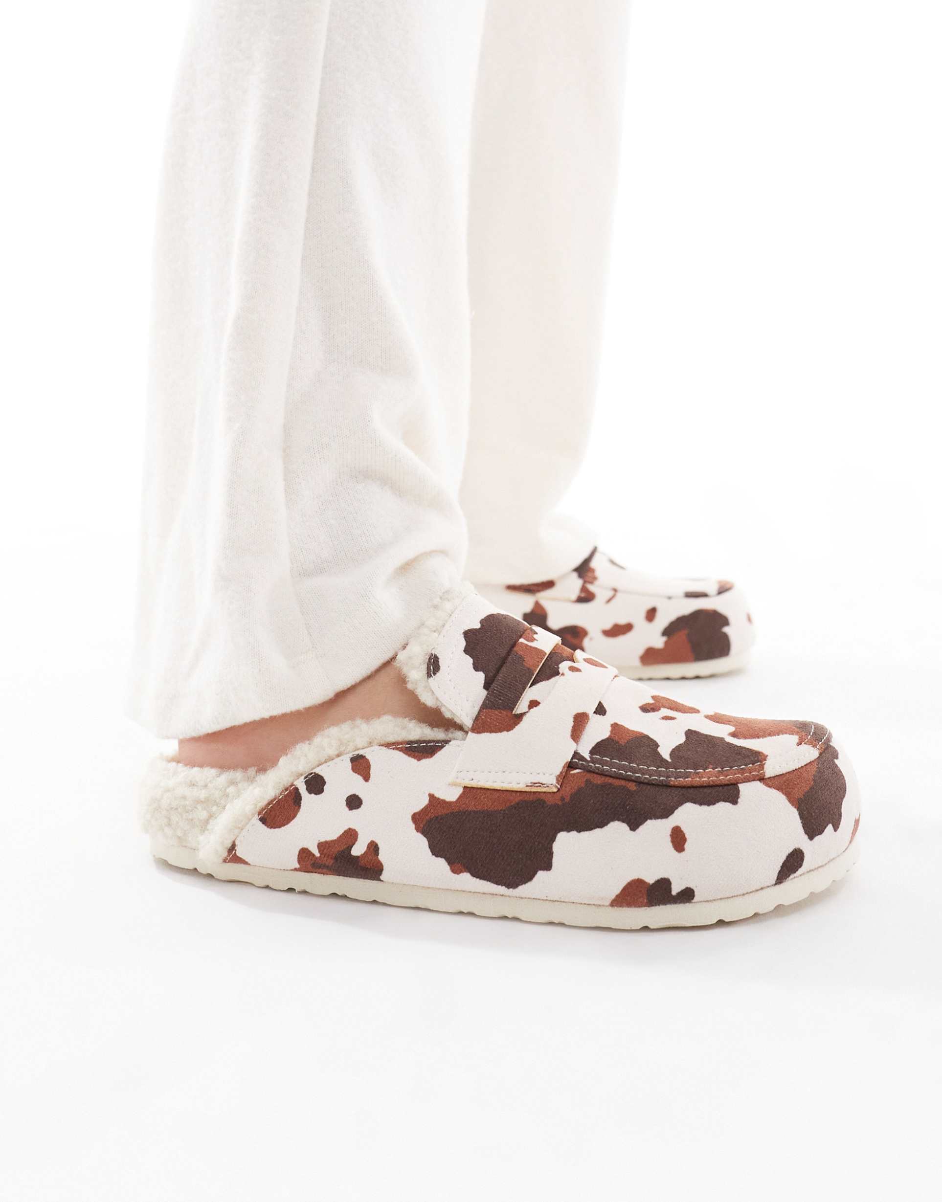 seqwl soda fur lined mules in cow