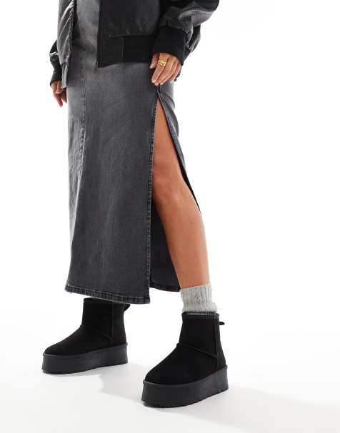 SEQWL – Stiefel in Schwarz mit flacher Plateausohle - view 1