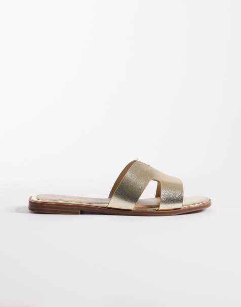 SEQWL – Storke – Guldfärgade platta sandaler med bred passform - view 1