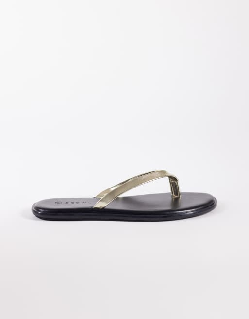 SEQWL – Svarta flip flops med guldfärgade remmar i jelly, 3 av 4