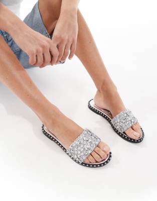SEQWL - Tarrogan - Flache Sandalen in Silber mit verziertem Riemen