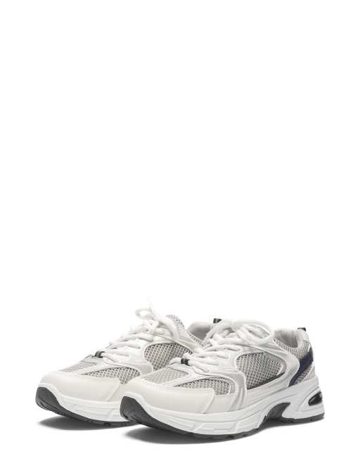 SEQWL Wedge training sneakers with lace up closure in white
