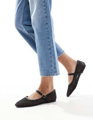 buckle strap ballet flats in black-White