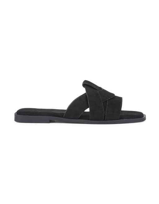 SEQWL Wide Fit Flat mules minimalist slides with crossover strap detail in black, 3 of 5
