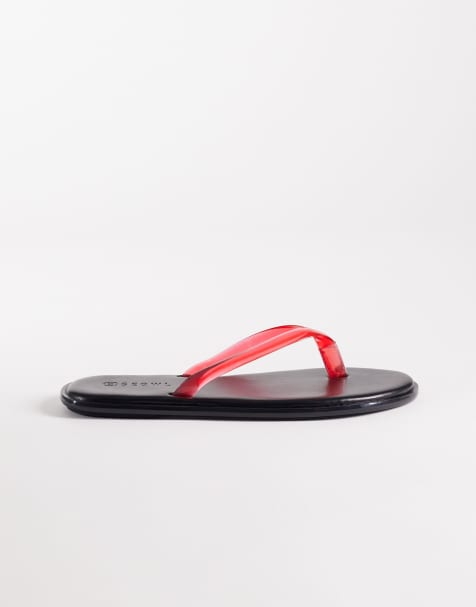 SEQWL Wide Fit jelly flip flops in black with red strap - view 1