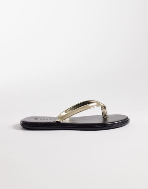 SEQWL Wide Fit jelly thongs in black with gold strap - view 1