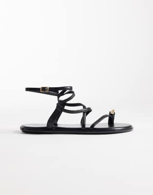  strappy flat sandals with gold embellishment 