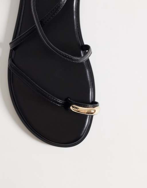 SEQWL Wide Fit strappy flat sandals with gold embellishment in black, 2 of 4