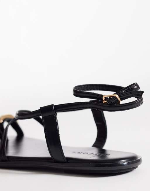 SEQWL Wide Fit strappy flat sandals with gold embellishment in black, 3 of 4