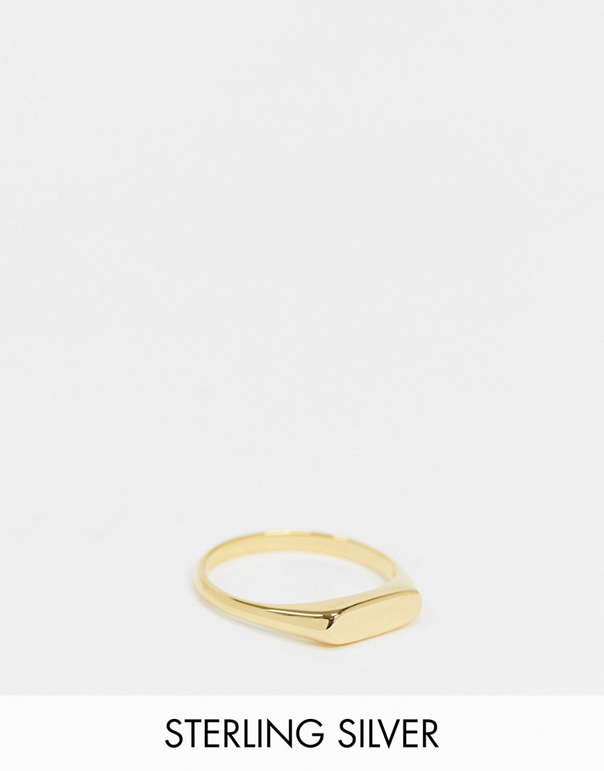 фото Серебряное кольцо с позолотой из 14-каратного золота asos design