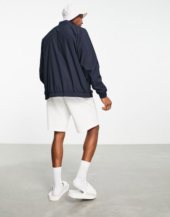https://images.asos-media.com/products/sergio-tacchini-logo-coach-jacket-in-navy/202698025-2?$n_550w$&wid=550&fit=constrain