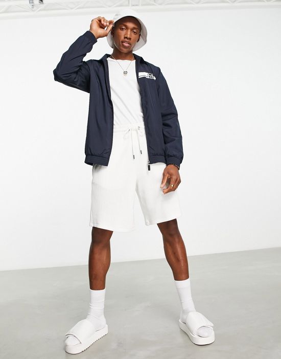 https://images.asos-media.com/products/sergio-tacchini-logo-coach-jacket-in-navy/202698025-4?$n_550w$&wid=550&fit=constrain