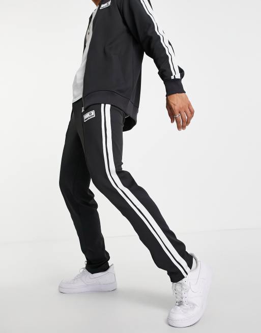 Sergio Tacchini tracksuit bottoms in gray | ASOS