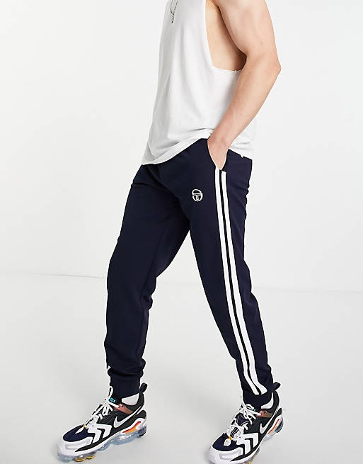 Sergio Tacchini tracksuit bottoms in navy | ASOS