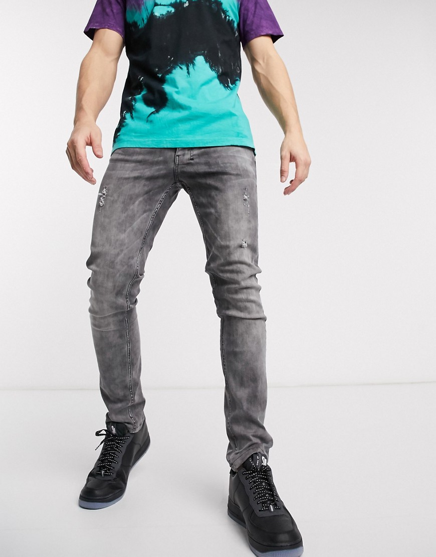 фото Серые джинсы скинни с рваной отделкой religion-серый