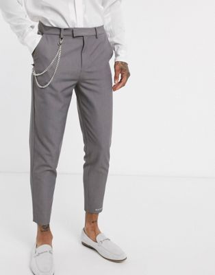 фото Серые суженные книзу брюки до щиколотки с логотипом и цепочкой mauvais-серый