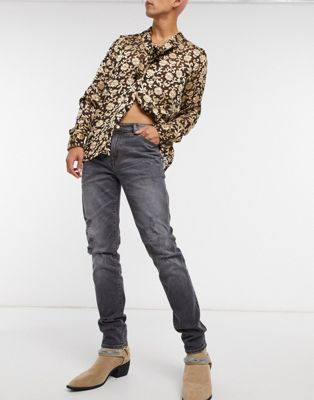 фото Серые выбеленные джинсы скинни с рваной отделкой asos design-серый