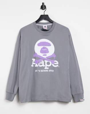 фото Серый лонгслив с принтом со скрещенными костями aape by a bathing ape aape by a bathing ape®